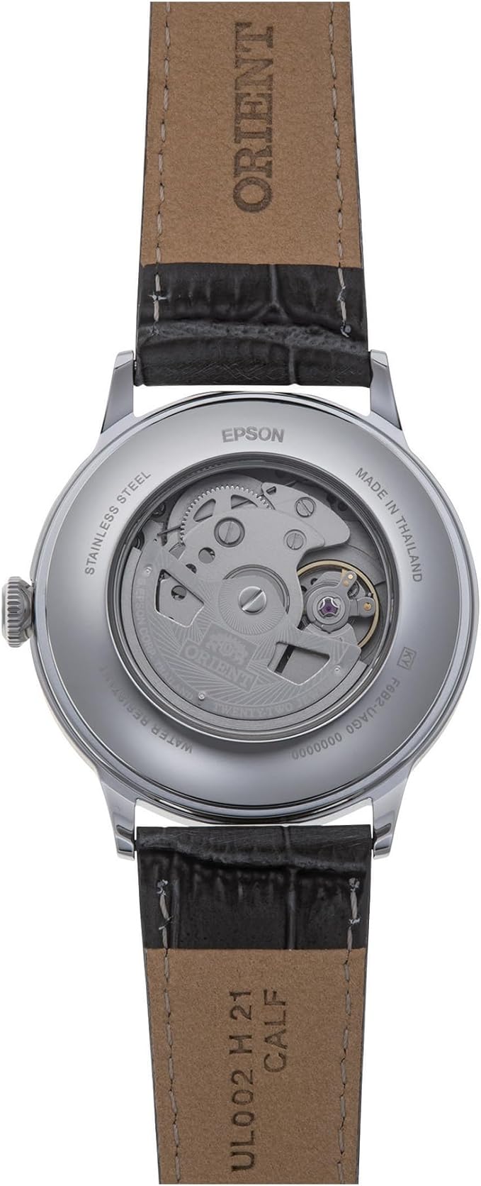 L'Orient Bambino Automatico RA-AK0704N30B mostra il suo movimento meccanico a vista e il fondello in acciaio inossidabile inciso, con la scritta EPSON e MADE IN THAILAND per l'autenticità.