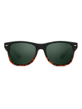 Gli Herling Occhiali da sole Aura sono caratterizzati da una struttura resistente, lenti verde scuro, montatura superiore nera e dettagli tartarugati arancio-marrone lungo il bordo inferiore, su sfondo bianco.