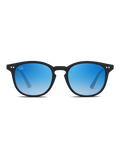 Gli Occhiali da sole Bogart di TWIG Concept Milano sono occhiali da sole unisex con montatura nera, lenti tonde blu sfumate e protezione UV 400, su sfondo bianco.