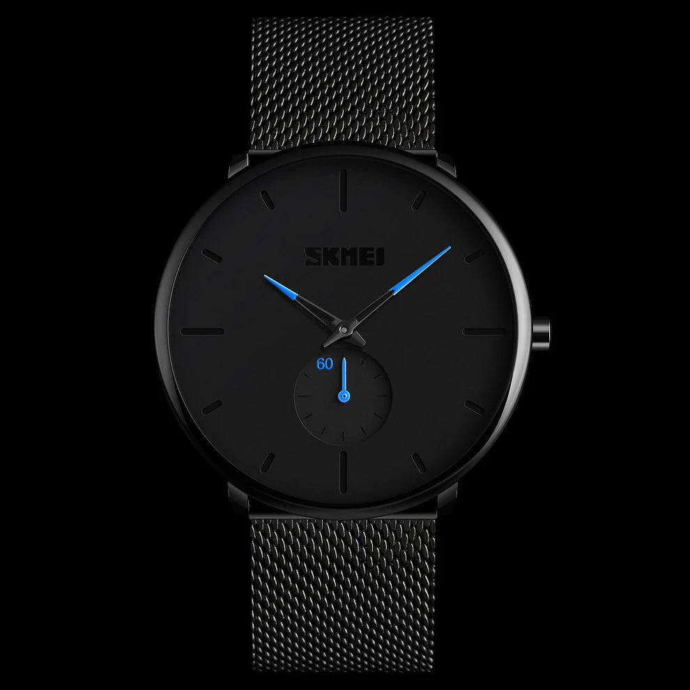 Lo Skmei Orologio minimalista ultraleggero ultrasottile nero blu presenta un elegante design nero con lancette delle ore e dei minuti blu, quadrante dei piccoli secondi e cinturino in maglia nera.