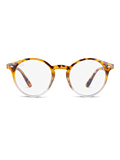 I TWIG Concept Milano Occhiali luce blu Jager sono caratterizzati da lenti rotonde, una montatura superiore tartarugata con metà inferiore trasparente e lenti luce blu che aiutano a ridurre lo stress visivo, su sfondo bianco.