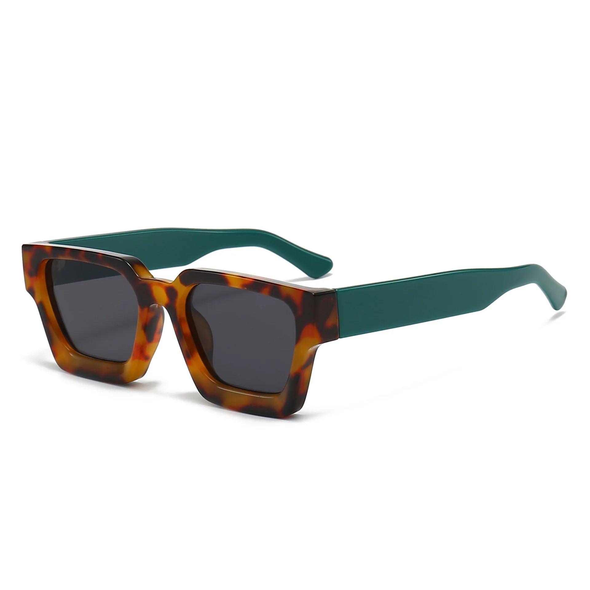 Un paio di PACOSHOP24.COM "Occhiali da sole con montatura quadrata Fashion Retrò Vintage" con montatura tartarugata, spesse stanghette verde acqua e lenti UV400 scure.