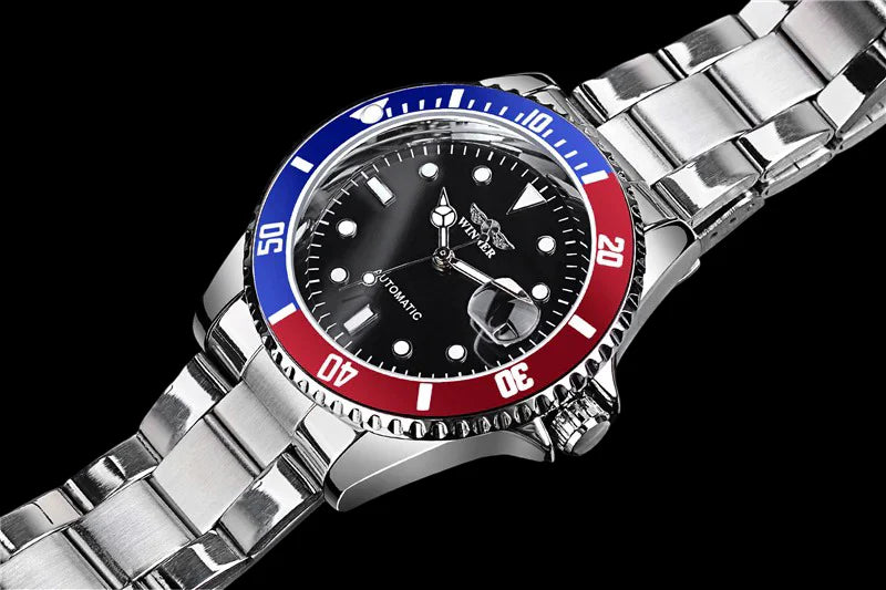 L'orologio automatico uomo meccanico PACOSHOP24.COM mod. Gmt è dotato di cinturino in acciaio inossidabile, quadrante nero, indici argentati e lunetta blu-rossa. Mostrato angolato su sfondo nero con etichetta "movimento automatico" visibile.