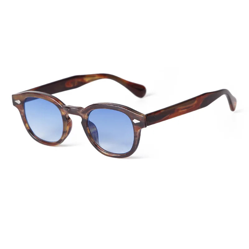 PACOSHOP24.COM Occhiali da sole vintage fashion retrò rotondi Unisex in policarbonato, con spesse aste e lenti blu, sono mostrati su sfondo bianco.
