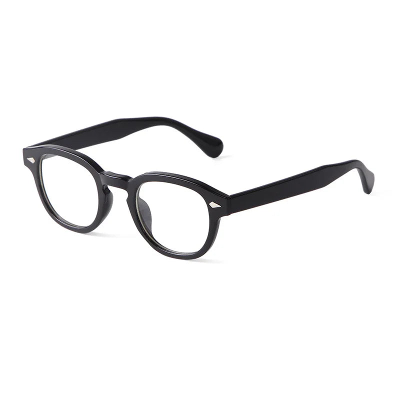 Un paio di Occhiali da sole vintage fashion retrò rotondi Unisex Policarbonato di PACOSHOP24.COM, con montatura nera spessa e lenti chiare, è mostrato angolato su sfondo bianco.
