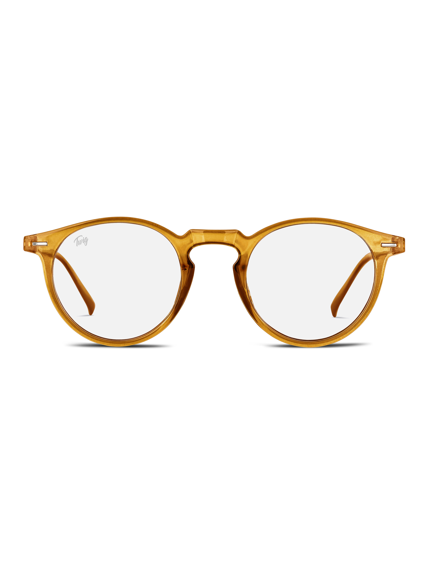 Gli Occhiali luce blu Watson di TWIG Concept Milano sono occhiali rotondi e trasparenti con montatura marrone chiaro, progettati per ridurre lo stress visivo da schermo, su sfondo bianco.