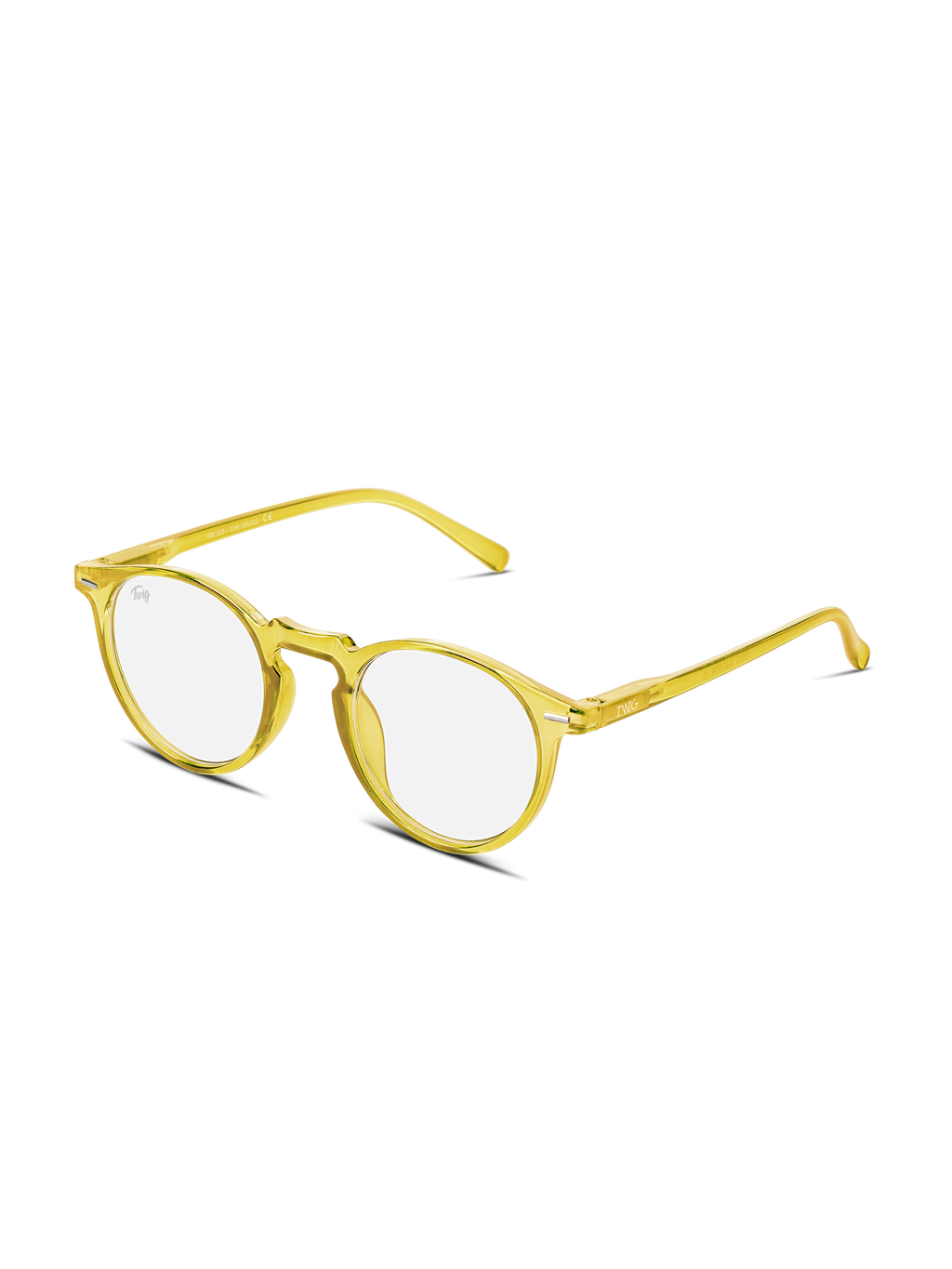 Gli Occhiali luce blu Watson di TWIG Concept Milano sono occhiali rotondi con lenti chiare e montatura gialla traslucida, pensati per l'uso del computer per ridurre l'affaticamento degli occhi, su sfondo bianco.