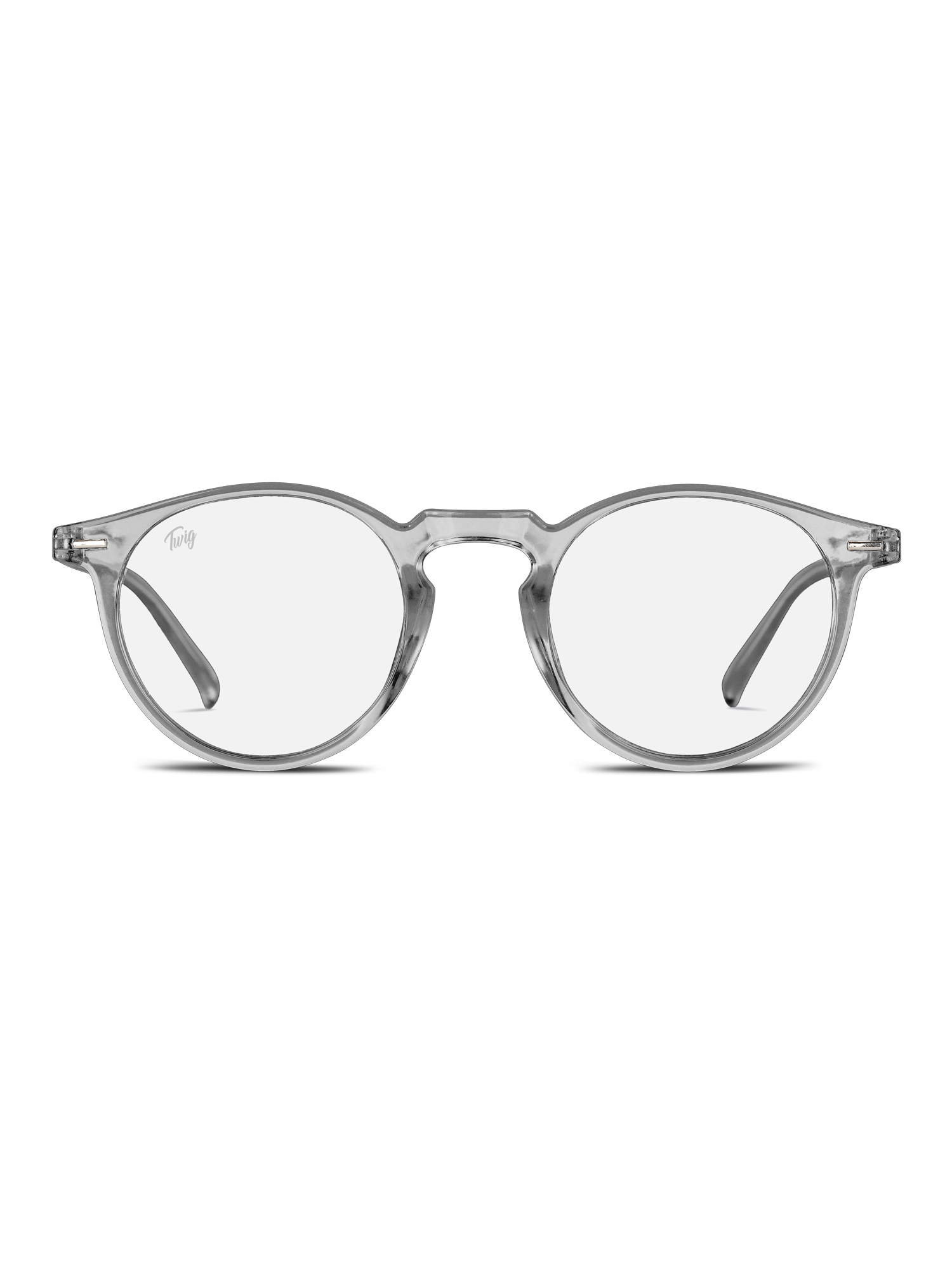 Occhiali luce blu Watson di TWIG Concept Milano: occhiali chiari e rotondi a luce blu con montatura trasparente e stanghette sottili, progettati per ridurre lo stress visivo. Mostrati su un semplice sfondo bianco.