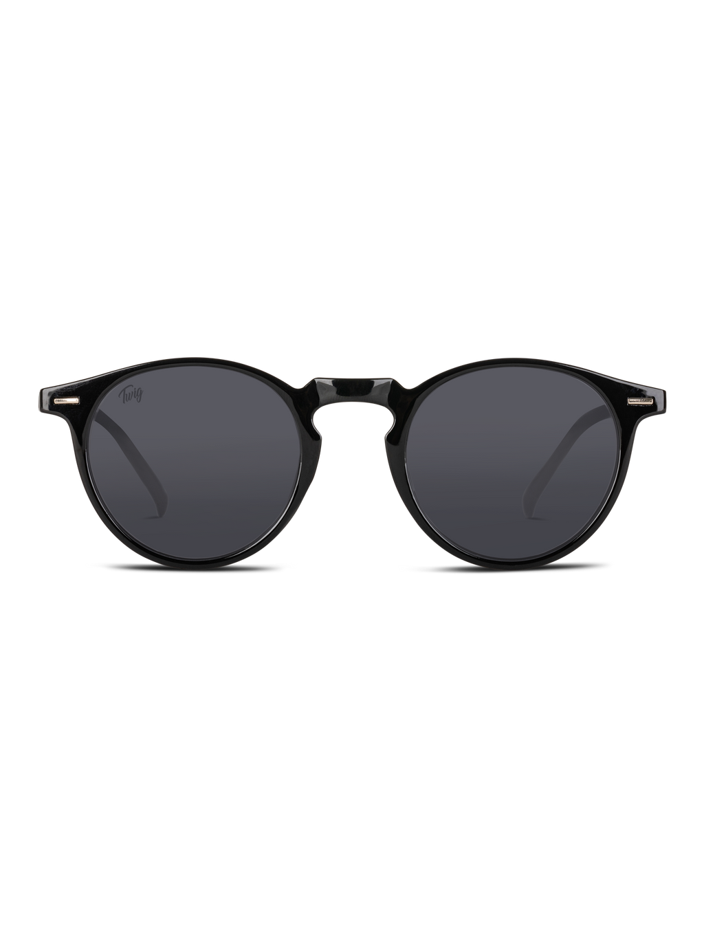 Occhiali da sole Watson di TWIG Concept Milano: occhiali da sole unisex rotondi neri con lenti scure, montatura in policarbonato lucida e protezione UV 400. In figura, su sfondo bianco.