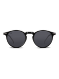 Occhiali da sole Watson di TWIG Concept Milano: occhiali da sole unisex rotondi neri con lenti scure, montatura in policarbonato lucida e protezione UV 400. In figura, su sfondo bianco.