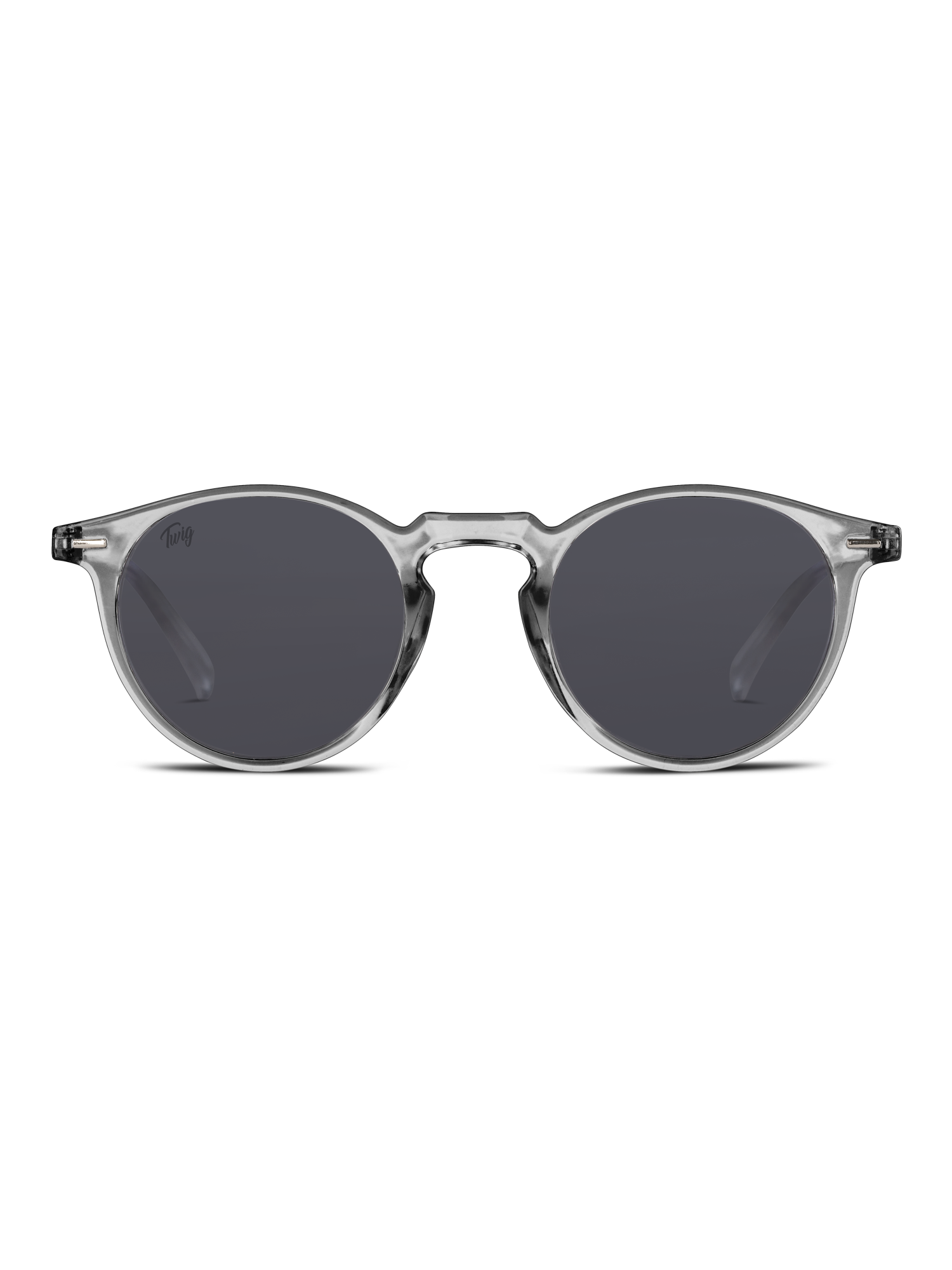 Gli Occhiali da sole Watson di TWIG Concept Milano sono occhiali da sole tondi unisex con montatura in policarbonato trasparente e lenti UV 400 colorate di nero, su sfondo bianco.