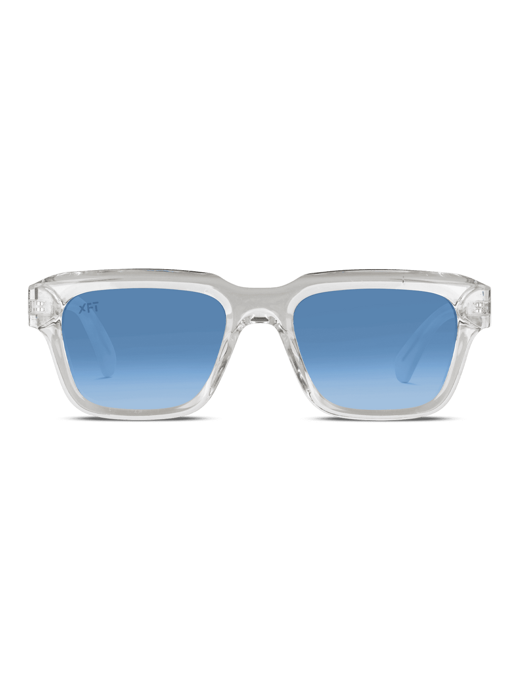 Gli occhiali da sole unisex Crystalith di X Frame Therapy sono caratterizzati da una montatura rettangolare chiara in acetato di cellulosa e da lenti blu sfumate su sfondo bianco.