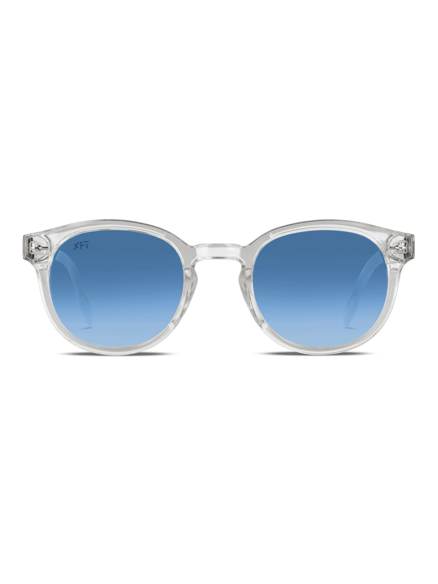 I Luminatrix di X Frame Therapy sono occhiali da sole rotondi unisex con montatura chiara e lenti blu sfumate con protezione UV, su sfondo bianco.