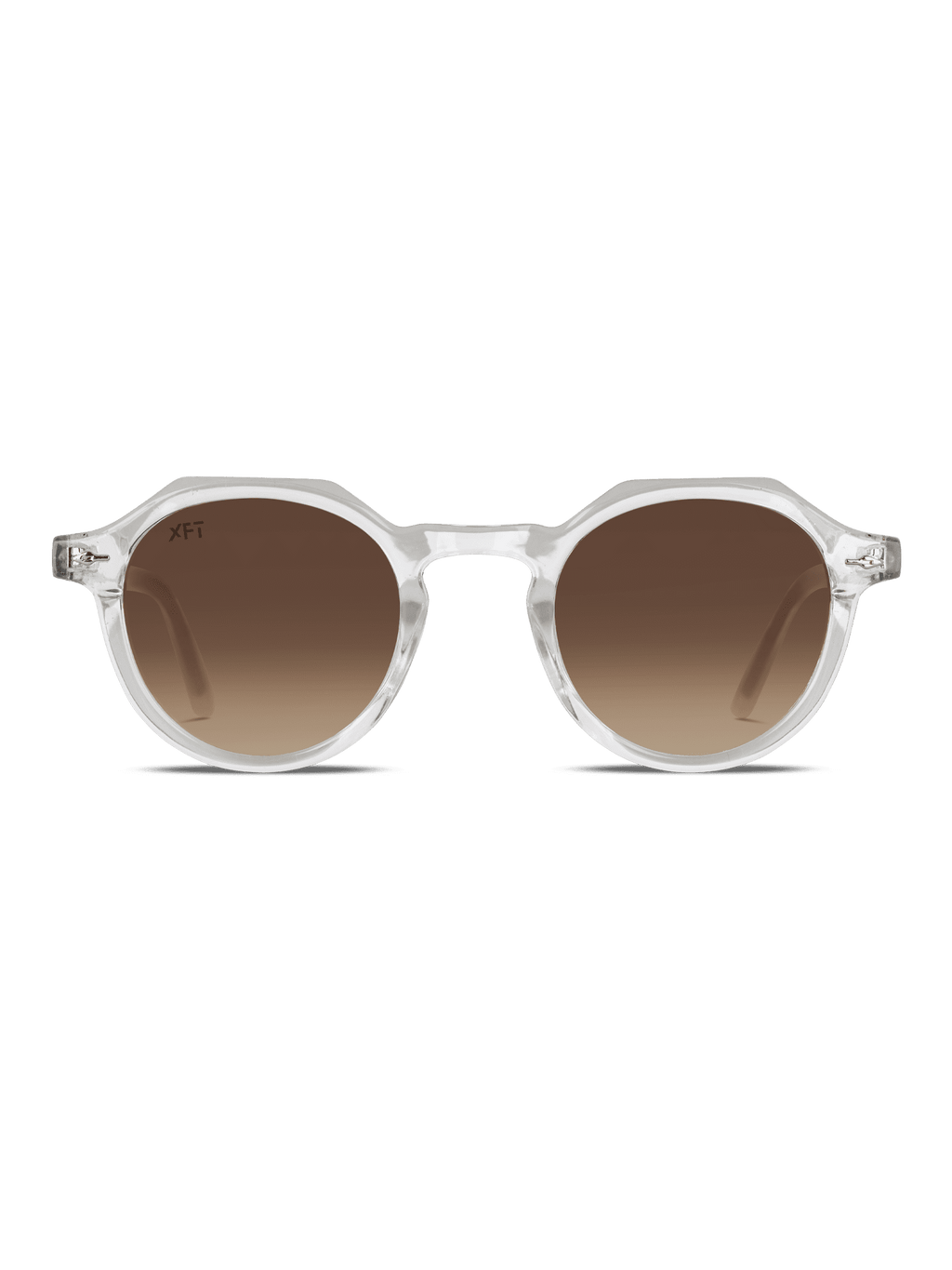 Occhiali da sole Lucentia rotondo Unisex di X Frame Therapy con montatura trasparente e lenti marroni sfumate UV400, mostrate su sfondo bianco.