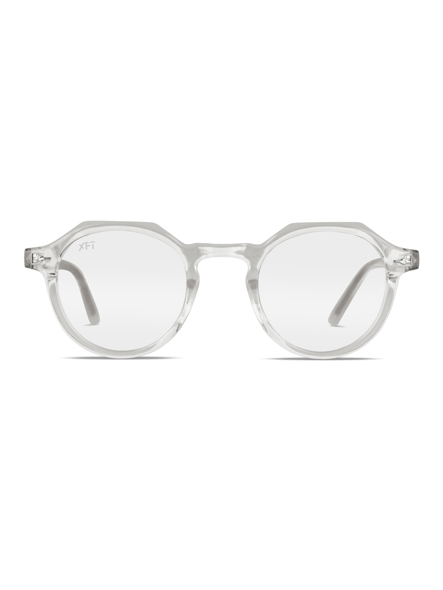 Gli Occhiali luce blu Lucentia lenti trasparenti Unisex di X Frame Therapy sono occhiali rotondi con montatura angolare in acetato di cellulosa trasparente, perfetti come schermi protettivi per occhiali, presentati su sfondo bianco.