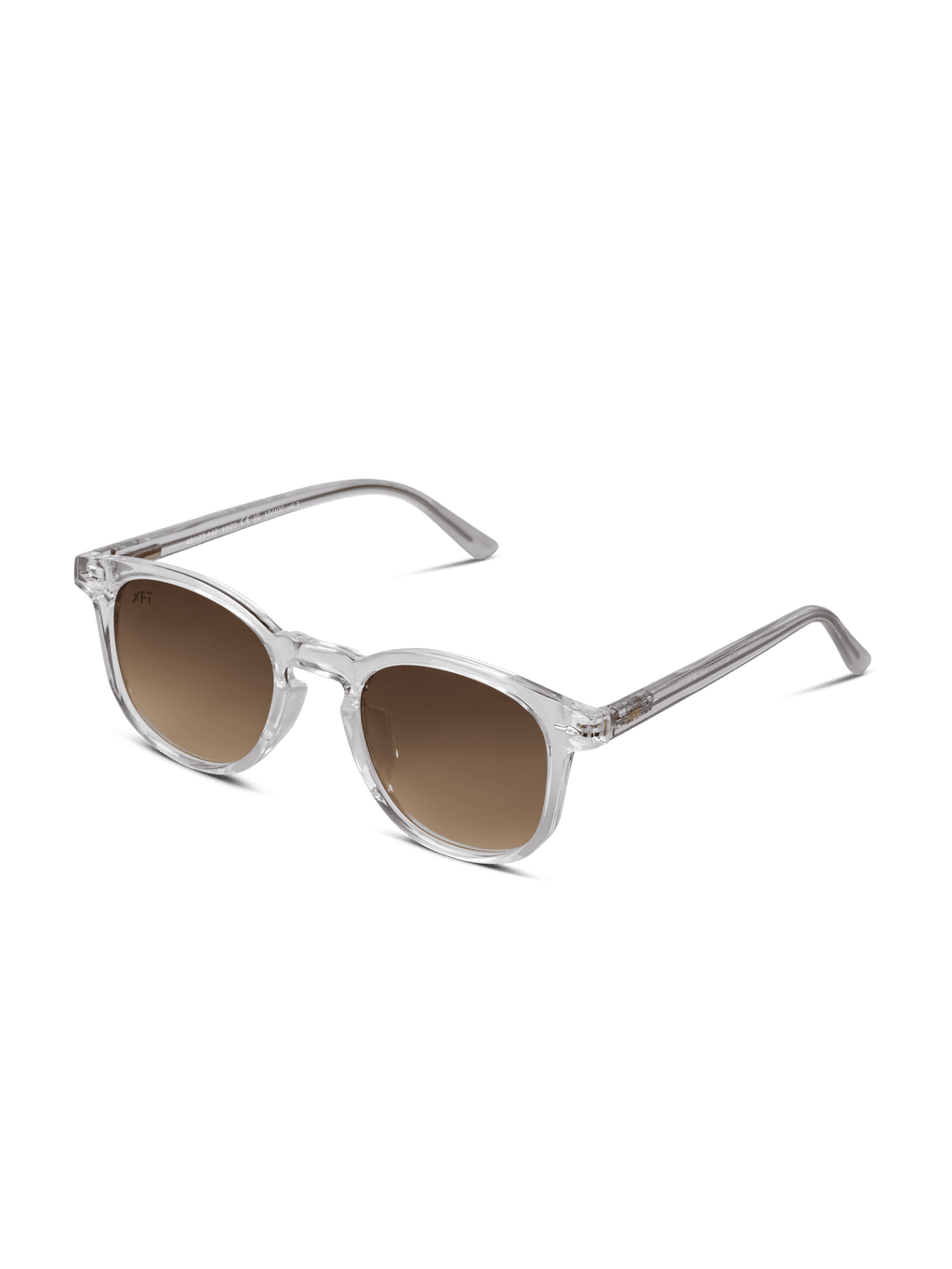Occhiali da sole rotondi Prismalith di X Frame Therapy con montatura in acetato di cellulosa trasparente e lenti marroni sfumate UV400, presentati angolati su sfondo bianco.
