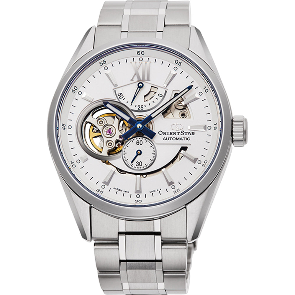 L'Orient Star Skeleton Automatico RE-AV0113S00B di Orient è dotato di movimento meccanico a vista, lancette blu, indicatore della riserva di carica, quadrante dei piccoli secondi, cinturino in acciaio inossidabile e quadrante bianco con accenti argento e oro.