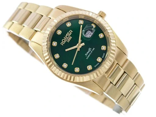 Il Roamer Amalfi 852844487920 orologio donna è caratterizzato da cassa dorata, quadrante verde con indici di diamanti, data a ore 3, lunetta scanalata e raffinato cinturino a maglie in metallo: un orologio Swiss Made di Roamer.